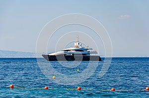 An yacht docked on seascape background .