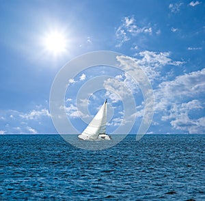 Yacht in a endless sea photo