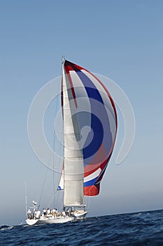 Yacht With Full Sail In The Ocean