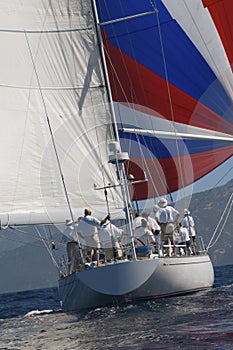 Yacht With Full Sail In The Ocean