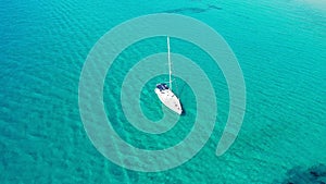 Yacht on lagoon at sunny day. Sailing boat. Yacht in the sea, aerial photography drone. Amazing yacht or sailing boat with a