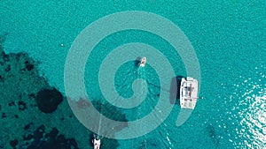 Yacht on lagoon at sunny day. Sailing boat. Yacht in the sea, aerial photography drone. Amazing yacht or sailing boat with a