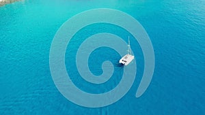 Yacht on lagoon at sunny day. Sailing boat. Yacht in the sea, aerial photography drone. Amazing yacht or sailing boat with a