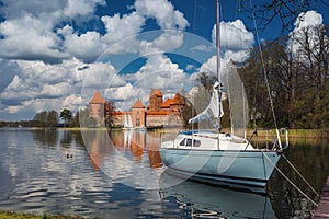 Yacht on the lake near Trakai Island Castle