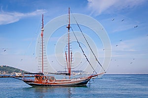 Yacht with lowered sails