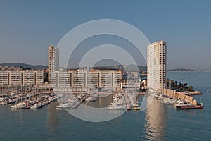 Yacht marina and town on sea coast. Toulon, France