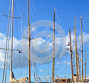 Yacht mast against sky