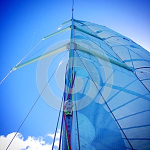 Yacht mast, rigging and sails on a sailboat