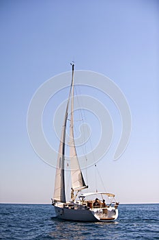 Yacht in the Mediterranean sea on blue sky background