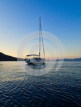 Yacht Moored in Bay, Dawn to Sunrise Light, Greece