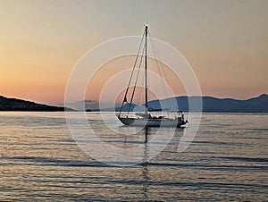 Yacht Moored in Bay, Early Sunrise, Greece