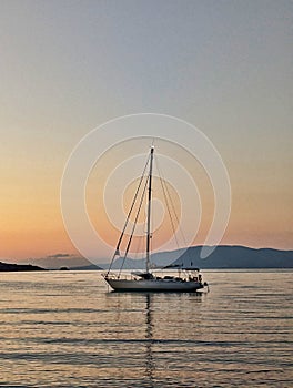 Yacht Moored in Bay, Early Sunrise, Greece