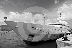 Yacht moored in philipsburg, sint maarten. Ship on sea pier on cloudy blue sky. Luxury travel on yacht, wanderlust