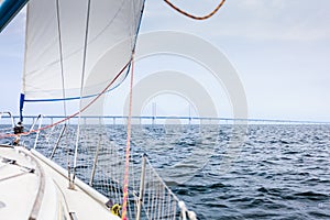 Yacht and oresund bridge between denmark sweden