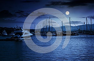 Yacht at the pier at night