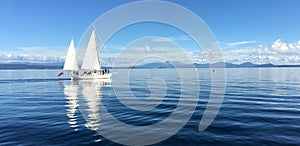 Yacht sail boats sailing over Lake Taupo New Zealand