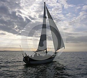 Yacht is sailing in the evening