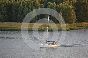 Yacht sailing on a finnish lake. Finland summer recreation