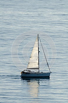 yacht sailing the sea, clear sky and blue water, recreational sport