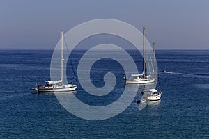 The yacht sails moored on the open sea region of Epirus, Greece