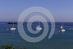 The yacht sails moored on the open sea region of Epirus, Greece