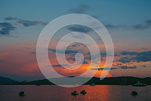 Yacht in the sea at sunset. Silhouette of a yacht on the backgro