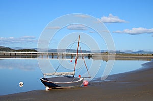 Yacht on shore River Kent estuary, Arnside