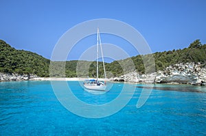 Yacht in Turquoise sea - Antipaxos Island - Ionian Sea â€“ Greece