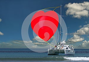 Yacht with Valentine Heart sail.