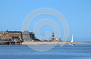 Yacht white sail, Beach lighthouse Fleetwood