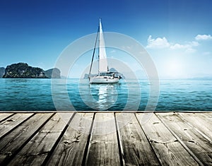 Yacht and wooden platform