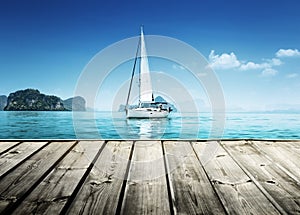 Yacht and wooden platform