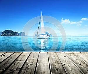Yacht and wooden platform