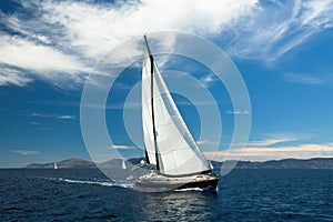 Yachting. Boat in sailing regatta. Luxury yachts. Travel.