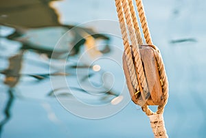 Yachting nautical background with sailboat pulley, tackle and nautical block