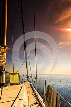 Yachting on sail boat during sunny weather