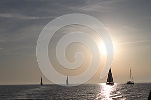Yachting to sun photo