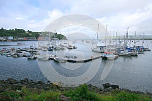 Yachts and boats moored at pontoons