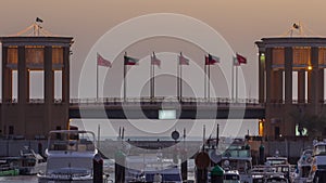 Yachts and boats at the Sharq Marina night to day timelapse in Kuwait. Kuwait City, Middle East