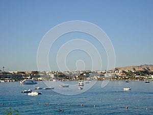 Yachts, boats and speedboats in the quiet bay of Sharm el Sheikh. photo