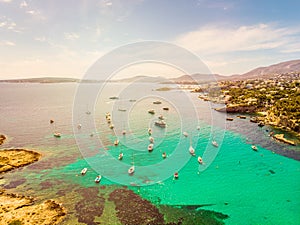 Yachts in the cove of turquoise sea. Aerial drone view of incredible landscape. Xinxell, Playa de Illetas, Palma de Mallorca,