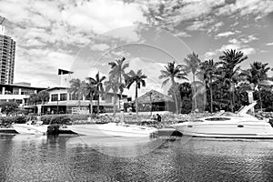 Yachts in miami marina bay at south beach with cloudy sky