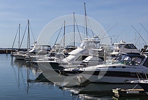 Yachts and motor boats moored at marina. Nelson Ba