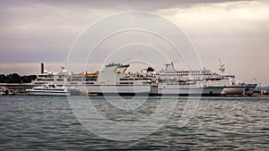 Yachts parking in harbor, Harbor in Split, Croatia. Water transport, beautiful vessel in the harbor, summer vacation, active