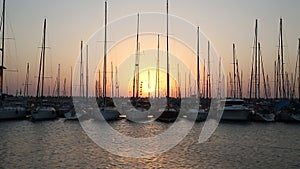 Yachts at the pier at sunset