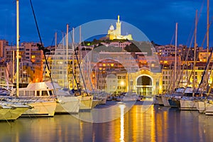 Yachts in the port in Marseille at night