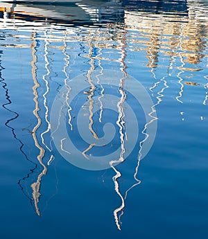 The yachts reflection in the water of Dahla tad-Dockyard bay, Ma