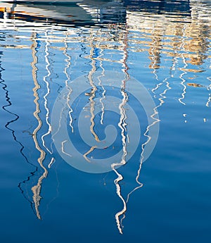 The yachts reflection in the water of Dahla tad-Dockyard bay, Ma photo