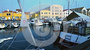 Yachts and sailboats docked in Copenhagen port, summer tourism, European town