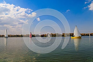 Yachts at sailing regatta on Dnieper river in Kremenchug, Ukraine